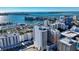 Stunning aerial view of Sarasota, Florida featuring high rise condos, marina, and the Ringling Bridge over Sarasota Bay at 33 S Palm Ave # 1501, Sarasota, FL 34236