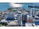 A high-angle view captures buildings, a marina, and waterfront features on a sunny day at 33 S Palm Ave # 1501, Sarasota, FL 34236
