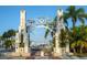 Scenic entrance to Sarasota Bayfront park, framed by decorative archways and lush tropical landscaping at 33 S Palm Ave # 1501, Sarasota, FL 34236