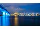 Spectacular night view of Sarasota skyline and the Ringling Bridge illuminated over the tranquil bay waters at 33 S Palm Ave # 1501, Sarasota, FL 34236