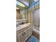Bathroom featuring a vanity with drawers, sink, mirror, and shower with a curtain at 3333 26Th E Ave # 1145, Bradenton, FL 34208