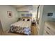 Cozy bedroom with beach themed decor, a bed, matching nightstands, and ample closet space at 3333 26Th E Ave # 1145, Bradenton, FL 34208