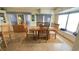 Dining room with large windows, comfortable seating, and nice light, creating a relaxing ambiance at 3333 26Th E Ave # 1145, Bradenton, FL 34208