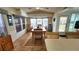 Bright dining room featuring a wood dining table, ample natural light, and a cozy atmosphere at 3333 26Th E Ave # 1145, Bradenton, FL 34208