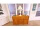 Dining room featuring a wood table, a buffet, large windows, and an island at 3333 26Th E Ave # 1145, Bradenton, FL 34208