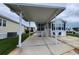 Inviting home showcasing covered parking, an accessible entrance and a well-kept lawn at 3333 26Th E Ave # 1145, Bradenton, FL 34208