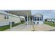 Charming single Gathering home with a covered carport, well-kept lawn, and cozy front porch at 3333 26Th E Ave # 1145, Bradenton, FL 34208