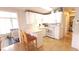 Compact, efficient kitchen design with breakfast bar and abundant white cabinetry at 3333 26Th E Ave # 1145, Bradenton, FL 34208