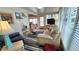 Warm living room blending a cozy atmosphere with natural light and stylish decor at 3333 26Th E Ave # 1145, Bradenton, FL 34208