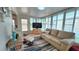Inviting living room bathed in sunlight, featuring comfortable furniture and a TV at 3333 26Th E Ave # 1145, Bradenton, FL 34208