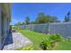 Fenced backyard and patio create a private outdoor living space for entertaining and relaxation at 3419 74Th Avenue E Cir, Sarasota, FL 34243