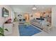 Bright living space featuring dining area and kitchen with a seamless transition between spaces at 3419 74Th Avenue E Cir, Sarasota, FL 34243