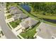 Beautiful aerial view of a single-story home with well-manicured lawns and landscaping at 4609 Deep Creek Ter, Parrish, FL 34219