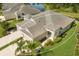 Stunning single-story home with a side-entry two-car garage and lush landscaping at 4609 Deep Creek Ter, Parrish, FL 34219