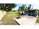 This backyard is perfect for entertaining and features a stone firepit and a new fence for added privacy at 6031 11Th E St, Bradenton, FL 34203