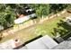 Large backyard for entertaining featuring a stone fire pit at 6031 11Th E St, Bradenton, FL 34203