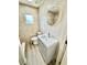 Bathroom featuring updated vanity, tile floors, and a tiled shower at 6031 11Th E St, Bradenton, FL 34203