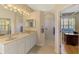 Bright bathroom with double sinks, lots of counter space, and a walk-in shower at 6644 Butlers Crest Dr, Bradenton, FL 34203