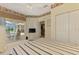 Bedroom with sliding glass doors to screened porch, ceiling fan and closet making it bright and airy at 6644 Butlers Crest Dr, Bradenton, FL 34203