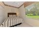 Bedroom featuring a comfortable bed, ceiling fan, window, and closet, perfect for relaxation at 6644 Butlers Crest Dr, Bradenton, FL 34203