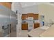 Kitchen featuring stainless steel refrigerator and ample counter space and sink at 6644 Butlers Crest Dr, Bradenton, FL 34203