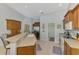 Kitchen featuring a breakfast bar and stainless steel appliances at 6644 Butlers Crest Dr, Bradenton, FL 34203