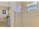 This is a close up of the tiled shower with built-in seat and window at 6644 Butlers Crest Dr, Bradenton, FL 34203
