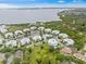 Aerial view of this lakeside community showing the pool and lush landscaping at 7611 34Th W Ave # 301, Bradenton, FL 34209