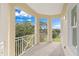 Spacious balcony with scenic views of lush greenery and blue skies, perfect for outdoor relaxation at 7611 34Th W Ave # 301, Bradenton, FL 34209