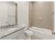 Modern bathroom featuring a vanity, bathtub and tiled shower at 7611 34Th W Ave # 301, Bradenton, FL 34209
