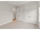 Clean bedroom with carpet, two double door closets and natural light at 7611 34Th W Ave # 301, Bradenton, FL 34209