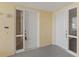 Condo entrance featuring two white doors, side window panels, and unit number at 7611 34Th W Ave # 301, Bradenton, FL 34209