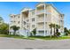 Stunning three-story building with lovely balconies and a beautifully landscaped exterior in a tropical setting at 7611 34Th W Ave # 301, Bradenton, FL 34209