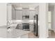 Modern kitchen with granite countertops, stainless steel appliances, and ample cabinet space at 7611 34Th W Ave # 301, Bradenton, FL 34209