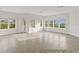 Bright, spacious living room featuring large windows offering natural light and views of the outdoors at 7611 34Th W Ave # 301, Bradenton, FL 34209