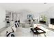 Open-concept living space with a modern kitchen, dining area, and comfortable seating, perfect for entertaining at 7611 34Th W Ave # 301, Bradenton, FL 34209