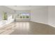 Expansive living room with tile flooring and several windows offering natural lighting at 7611 34Th W Ave # 301, Bradenton, FL 34209