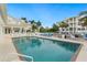 Inviting community pool area with comfortable lounge chairs and well-maintained surroundings, perfect for relaxation at 7611 34Th W Ave # 301, Bradenton, FL 34209