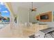 Pool bar boasts grill, outdoor seating and tv for entertainment by the pool at 7611 34Th W Ave # 301, Bradenton, FL 34209