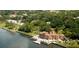 Expansive waterfront estate boasting lush landscaping, Mediterranean architecture, and private dock at 809 40Th St, Sarasota, FL 34234