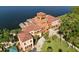 Estate with a tile roof and an expansive lawn at 809 40Th St, Sarasota, FL 34234