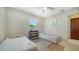 Light bedroom with twin beds and modern decor at 809 40Th St, Sarasota, FL 34234