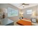 Neutral bedroom with two windows providing ample natural light at 809 40Th St, Sarasota, FL 34234