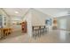 Open living area featuring a built-in bar, and views into the kitchen at 809 40Th St, Sarasota, FL 34234