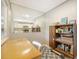 Cozy sitting area with a large mirror and view into the kitchen at 809 40Th St, Sarasota, FL 34234