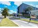 Modern building with palm trees alongside a street at 809 40Th St, Sarasota, FL 34234