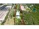Aerial view of waterfront property with lush landscape at 9403 9Th Nw Ave, Bradenton, FL 34209