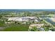 Beautiful waterfront lot with lush green surroundings offering a serene and private setting for building your dream home at 9403 9Th Nw Ave, Bradenton, FL 34209