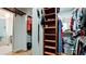 Spacious walk-in closet with custom shelving, rod, and dressing area next to the bathroom at 9403 9Th Nw Ave, Bradenton, FL 34209