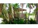 Beautiful wooden gazebo with palm tree views at 9403 9Th Nw Ave, Bradenton, FL 34209